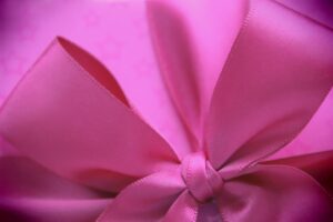 Pink satin bow on a gift